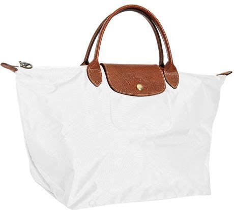 white folding longchamp bag